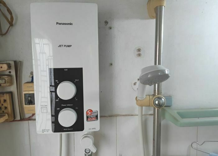 ve-sinh-may-nuoc-nong-panasonic